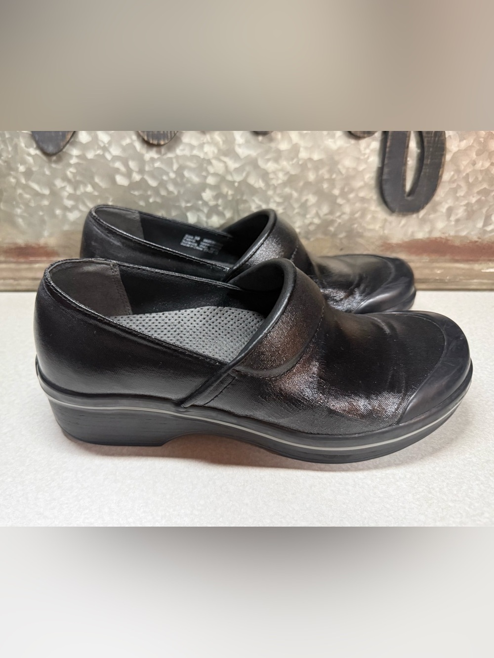 Dansko Black Leather Slip-On Clog